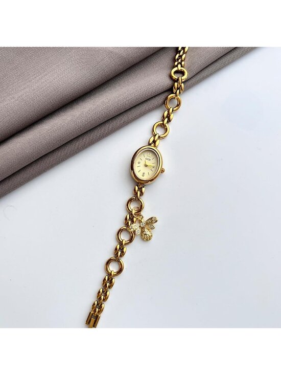 Women\'s All Gold Analog Quartz Alloy Steel Oval Roman Numeral Bracelet Watch